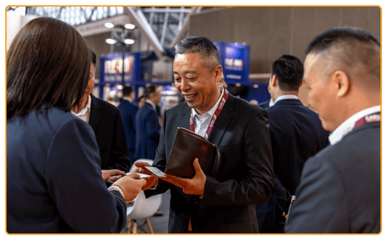 Image showing business professionals exchanging business cards at Intermodal Europe