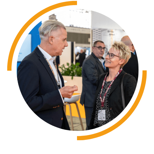 Image showing attendees walking the show floor at Intemodal Europe, with a shipping container in the background